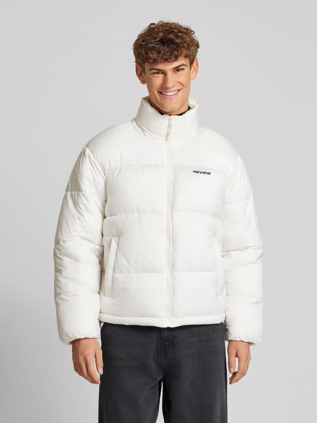 Off-white quilted jacket with a stand-up collar