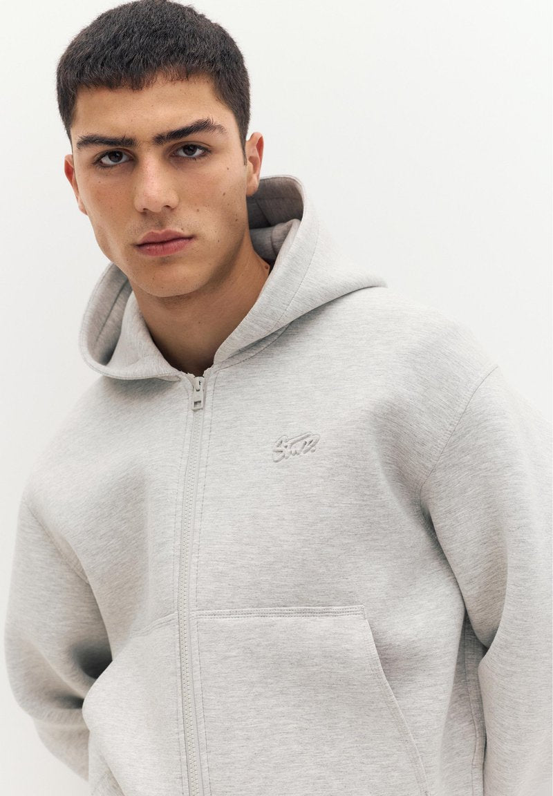 Sweat-shirt zip pull and bear