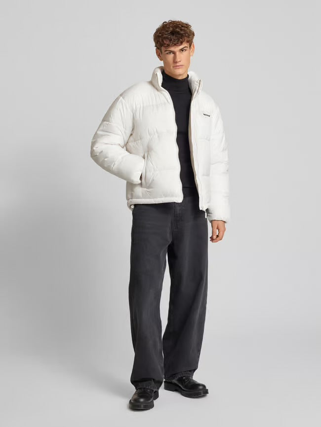 Off-white quilted jacket with a stand-up collar