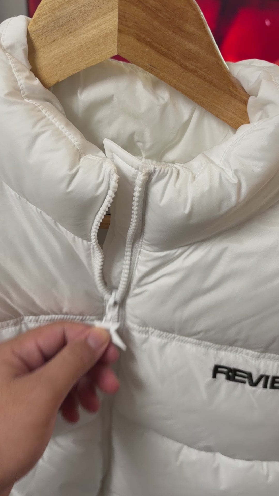 Off-white quilted jacket with a stand-up collar