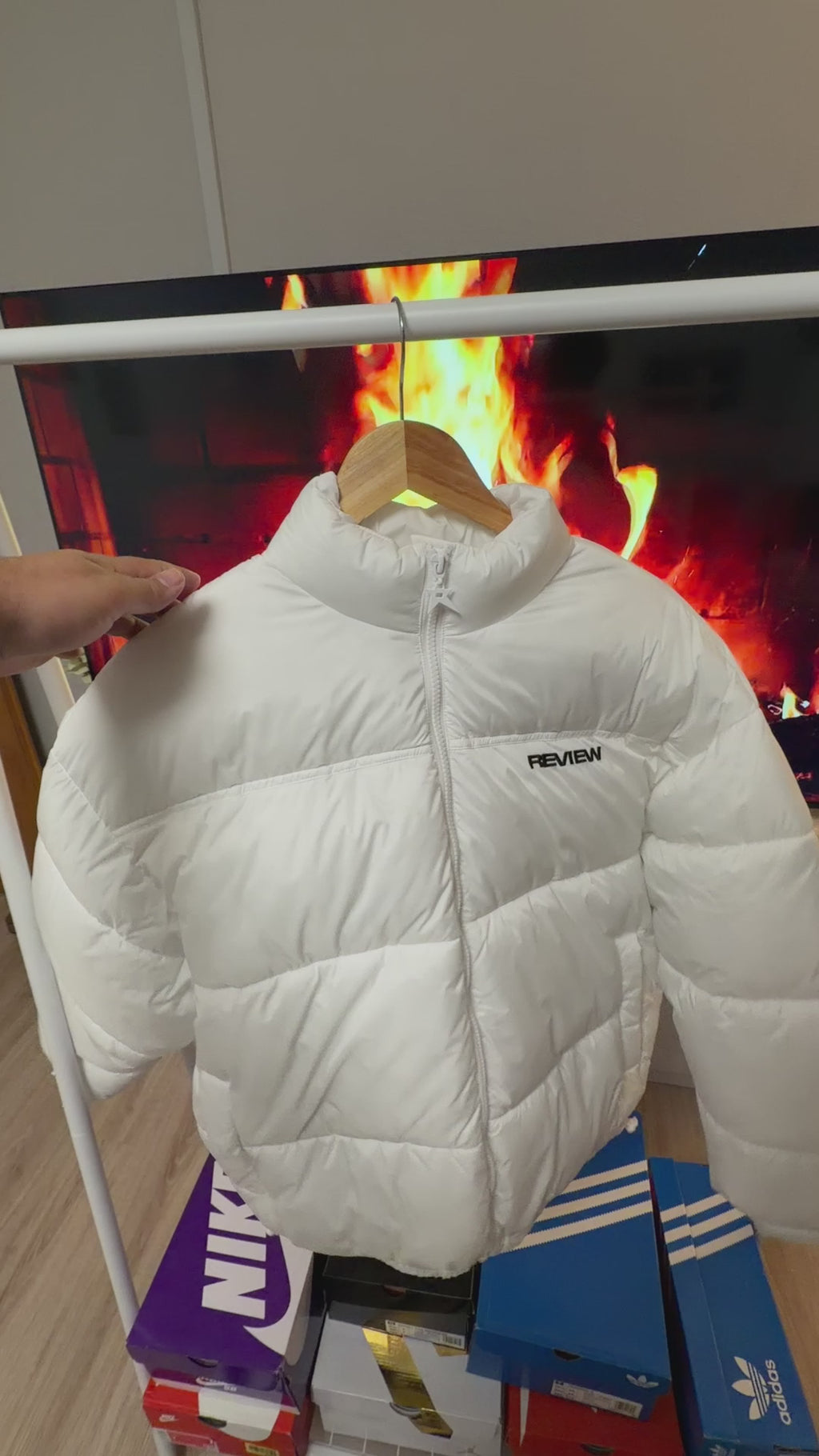 Off-white quilted jacket with a stand-up collar